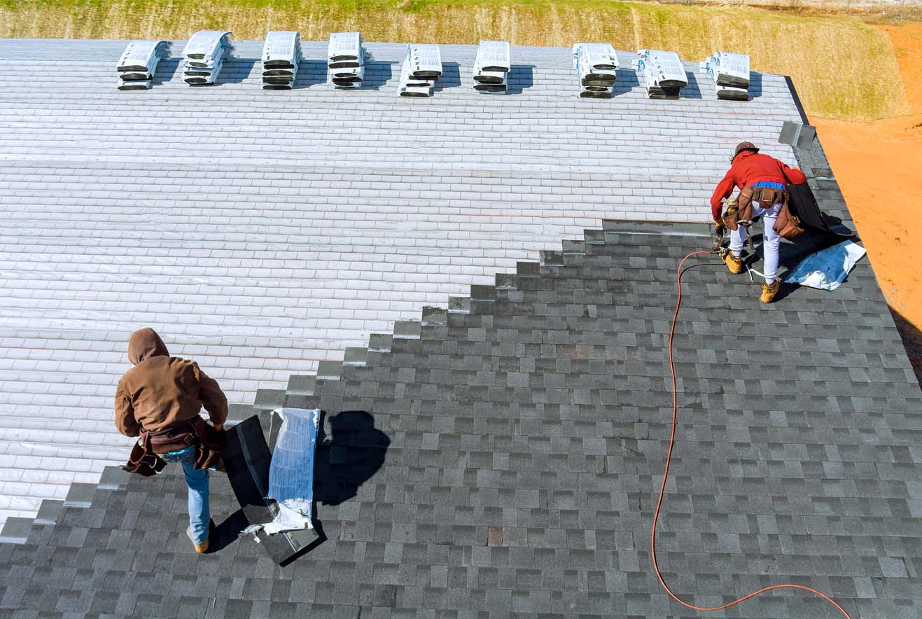 Builder Working On Roof Of New Building, Construction Worker Wea