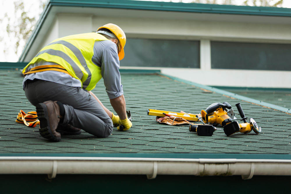 roof-replacement3 Builder Working On Roof Of New Building, Construction Worker Wea